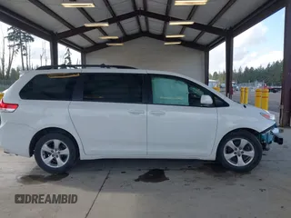 2014 Toyota Sienna LE AAS with VIN 5TDKK3DC4ES505293, listed as a IAAI auction lot 42021409 with 70,319 mi miles. Bid and sale history available at carsss.com. Image 13.