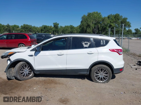 2016 Ford Escape SE with VIN 1FMCU9GX9GUC62462, listed as a IAAI auction lot 39999808 with Not Provided miles. Bid and sale history available at carsss.com. Image 14.