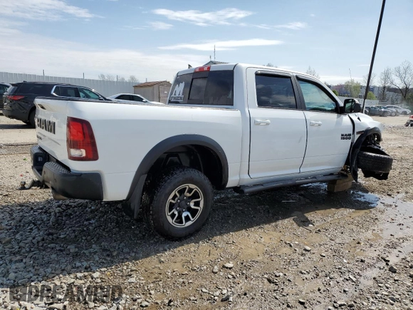 2017 Ram 1500 Rebel z VIN 1C6RR6YT2HS693644, wystawiony jako Copart lot #52570215 z przebiegiem 127 023 mil mil oraz Nie do naprawy • Non repairable. Historia ofert i sprzedaży dostępna na DreamBid. Obrazek 3.
