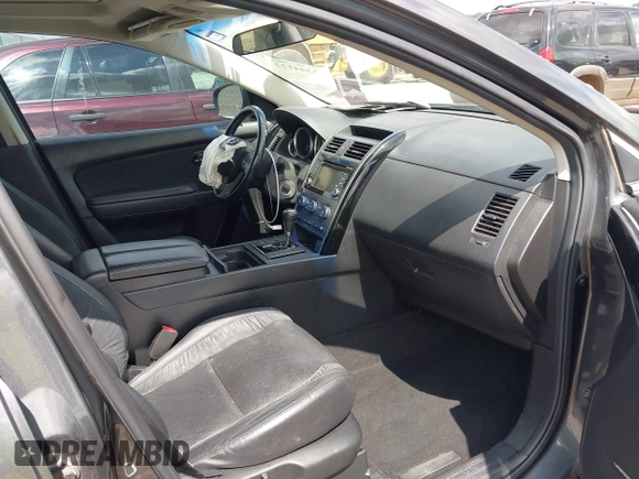 2015 Mazda CX-9 Touring with VIN JM3TB2CA7F0460232, listed as a IAAI auction lot 42344122 with 103,478 mi miles and . Bid and sale history available at DreamBid. Image 5.