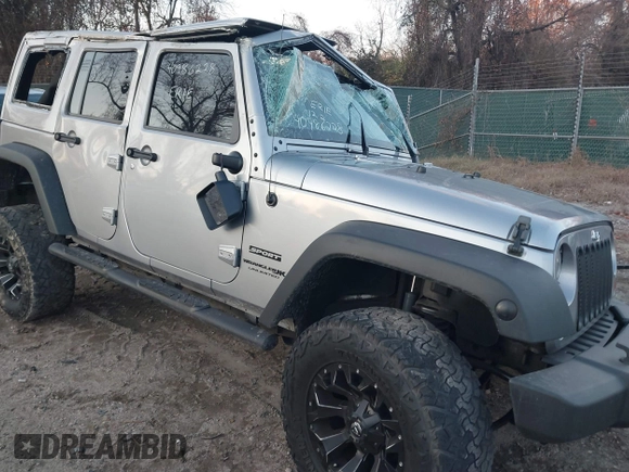 2018 Jeep Wrangler JK Unlimited Sport S with VIN 1C4BJWDG5JL862100, listed as a IAAI auction lot 40986228 with 1 mi miles. Bid and sale history available at carsss.com. Image 22.