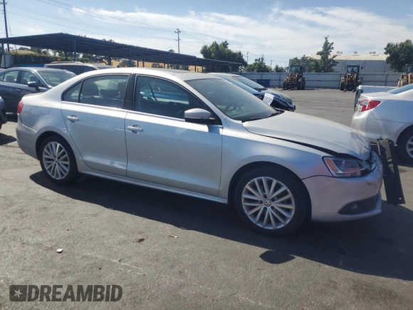 2012 Volkswagen Jetta SEL with VIN 3VWLP7AJ6CM324271, listed as a Copart auction lot 59986855 with 129,002 mi miles and Salvage title. Bid and sale history available at DreamBid. Image 4.