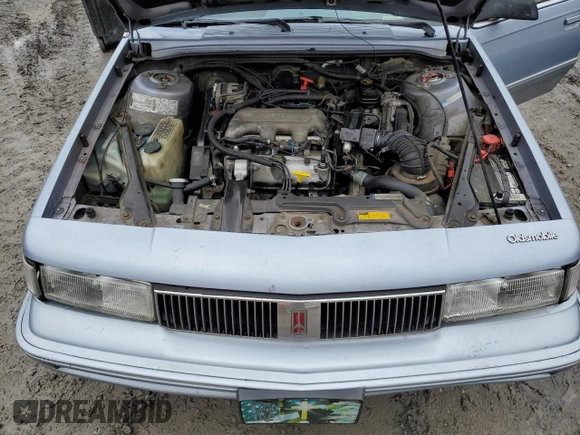 1994 Oldsmobile Cutlass Ciera S z VIN 1G3AG55M1R6362731, wystawiony jako Copart lot #83832424 z przebiegiem 145 973 mil mil oraz Szkoda całkowita • Salvage title. Historia ofert i sprzedaży dostępna na DreamBid. Obrazek 11.