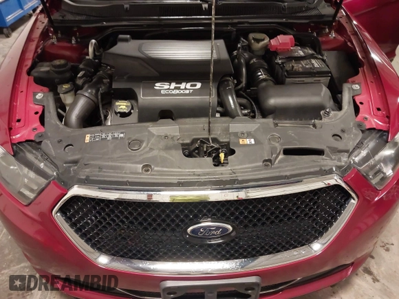 2014 Ford Taurus SHO with VIN 1FAHP2KT9EG130834, listed as a IAAI auction lot 41748199 with 98,857 mi miles and . Bid and sale history available at carsss.com. Image 10.