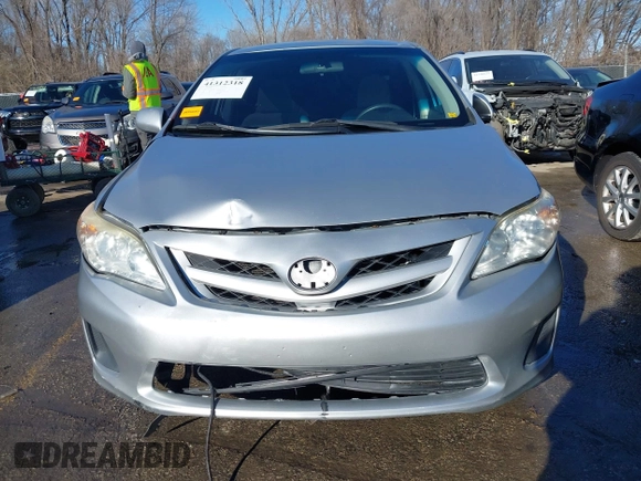 2011 Toyota Corolla L with VIN JTDBU4EE8B9167374, listed as a IAAI auction lot 41312318 with 189,903 mi miles. Bid and sale history available at carsss.com. Image 6.