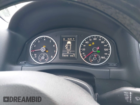 2013 Volkswagen Tiguan S with VIN WVGAV3AX7DW624136, listed as a IAAI auction lot 42256657 with 124,000 mi miles and . Bid and sale history available at DreamBid. Image 7.
