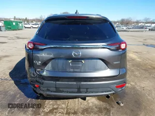 2022 Mazda CX-9 Sport with VIN JM3TCBBY5N0614589, listed as a IAAI auction lot 41295944 with 49,193 mi miles and . Bid and sale history available at DreamBid. Image 16.