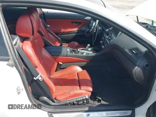 2013 BMW M6 z VIN WBSLX9C52DD159906, wystawiony jako IAAI lot #42095042 z przebiegiem 105 463 mil mil oraz . Historia ofert i sprzedaży dostępna na DreamBid. Obrazek 5.