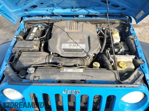 2012 Jeep Wrangler Sport with VIN 1C4AJWAG3CL144015, listed as a Copart auction lot 50969705 with 93,417 mi miles and Salvage title. Bid and sale history available at DreamBid. Image 11.