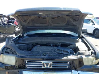 2008 Honda Ridgeline RTL with VIN 2HJYK16528H524064, listed as a IAAI auction lot 42588596 with 180,776 mi miles and . Bid and sale history available at DreamBid. Image 10.