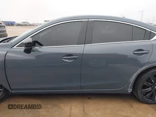 2021 Mazda 6 Carbon Edition with VIN JM1GL1WY0M1600414, listed as a IAAI auction lot 41551393 with 36,780 mi miles and . Bid and sale history available at DreamBid. Image 14.