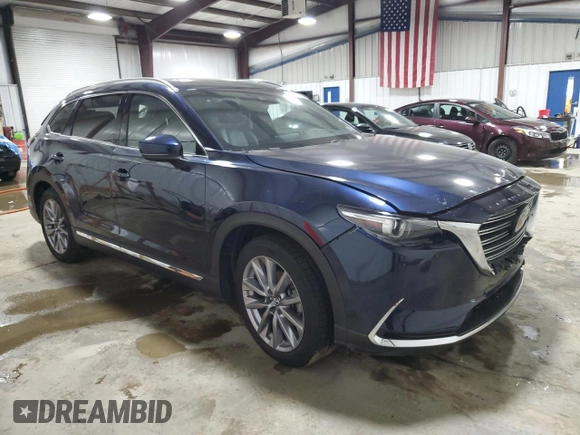 2023 Mazda CX-9 Grand Touring with VIN JM3TCBDY1P0630868, listed as a Copart auction lot 56321205 with 50,427 mi miles and Salvage title. Bid and sale history available at DreamBid. Image 4.