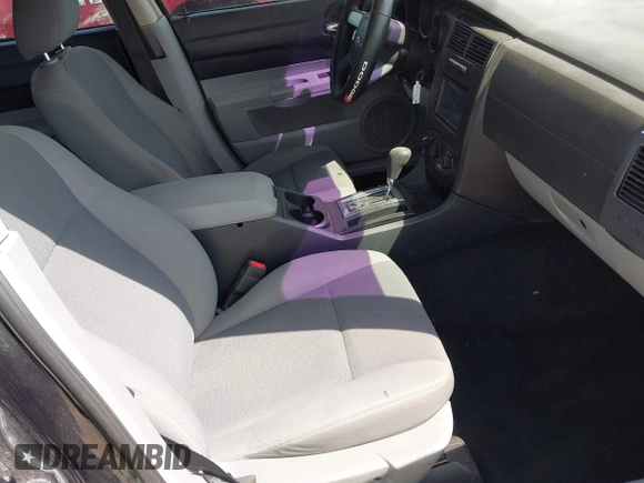 2007 Dodge Charger with VIN 2B3KA43G27H652874, listed as a IAAI auction lot 42030171 with 216,231 mi miles and . Bid and sale history available at DreamBid. Image 5.