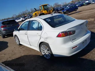 2011 Mitsubishi Lancer GTS with VIN JA32U8FW3BU030708, listed as a IAAI auction lot 41826170 with 213,889 mi miles. Bid and sale history available at carsss.com. Image 3.