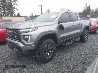 2024 GMC Canyon 4WD AT4X with VIN 1GTP6EEK9R1163595, listed as a IAAI auction lot 41568532 with 5,742 mi miles. Bid and sale history available at carsss.com. Image 2.