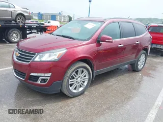 2015 Chevrolet Traverse LT z VIN 1GNKRGKD1FJ292257, wystawiony jako IAAI lot #42217359 z przebiegiem 93 892 mil mil oraz . Historia ofert i sprzedaży dostępna na DreamBid. Obrazek 2.