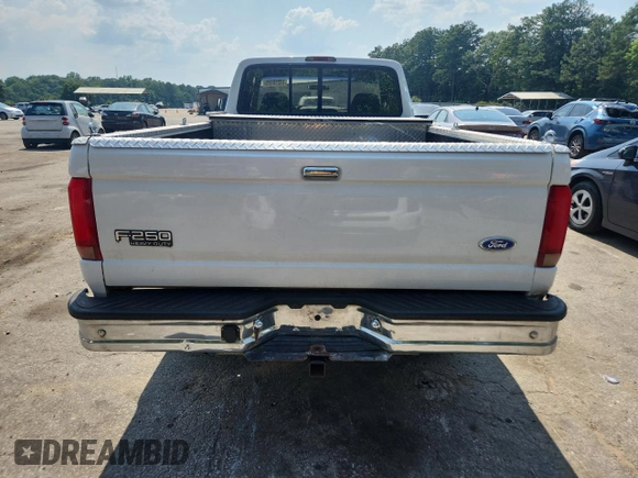 1997 Ford F-250 с VIN 1FTHX25F1VED01393, выставлен на аукционе Copart как лот 61215175 с пробегом 176 801 миль миль и Списание • Salvage title. История ставок и продаж доступна на DreamBid. Изображение 6.