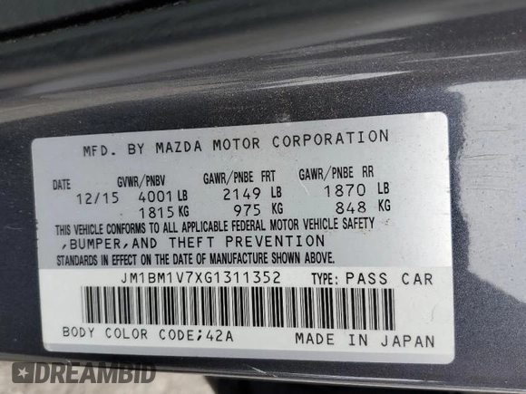 2016 Mazda 3 i Touring z VIN JM1BM1V7XG1311352, wystawiony jako Copart lot #56194805 z przebiegiem 115 321 mil mil oraz Szkoda całkowita • Salvage title. Historia ofert i sprzedaży dostępna na DreamBid. Obrazek 12.