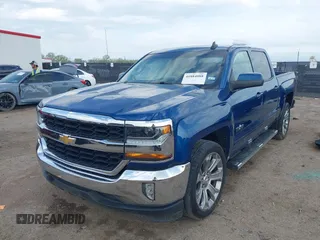 2018 Chevrolet Silverado 1500 LT with VIN 3GCPCREH1JG125997, listed as a IAAI auction lot 41884888 with 122,406 mi miles and . Bid and sale history available at DreamBid. Image 17.