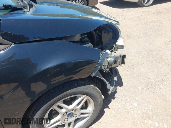 2019 Ford Fiesta SE z VIN 3FADP4EJ0KM125724, wystawiony jako IAAI lot #42320657 z przebiegiem 53 728 mil mil oraz . Historia ofert i sprzedaży dostępna na DreamBid. Obrazek 18.