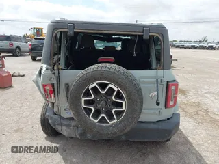 2023 Ford Bronco z VIN 1FMEE5BP9PLA97587, wystawiony jako IAAI lot #42168516 z przebiegiem 29 622 mil mil oraz . Historia ofert i sprzedaży dostępna na DreamBid. Obrazek 16.