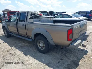 2003 Nissan Frontier XE with VIN 1N6ED29XX3C441446, listed as a IAAI auction lot 42622685 with 142,269 mi miles and . Bid and sale history available at DreamBid. Image 3.