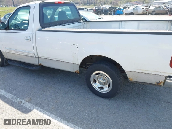 2002 Ford F-150 XL with VIN 1FTRF17W72NA67786, listed as a IAAI auction lot 41869585 with 180,262 mi miles. Bid and sale history available at carsss.com. Image 13.