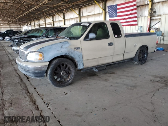 1999 Ford F-150 with VIN 1FTZX172XXKA26359, listed as a Copart auction lot 52215805 with 268,403 mi miles and Salvage title. Bid and sale history available at DreamBid. Image 1.
