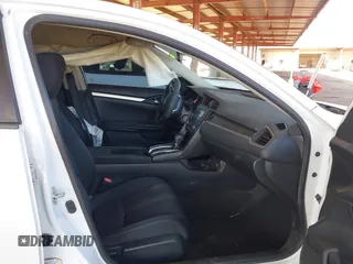 2020 Honda Civic LX with VIN 19XFC2F66LE007328, listed as a IAAI auction lot 41852111 with 135,956 mi miles and . Bid and sale history available at DreamBid. Image 5.