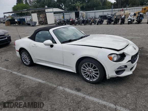 2017 FIAT 124 Spider Classica with VIN JC1NFAEKXH0126511, listed as a Copart auction lot 59601185 with Not provided miles and Salvage title. Bid and sale history available at DreamBid. Image 4.