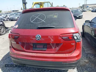 2018 Volkswagen Tiguan S with VIN 3VV1B7AX3JM128705, listed as a IAAI auction lot 42110808 with 60,589 mi miles and . Bid and sale history available at DreamBid. Image 16.