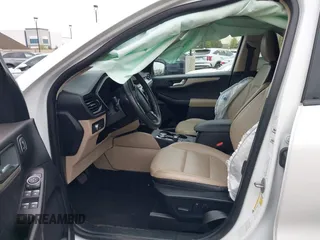 2020 Ford Escape SEL with VIN 1FMCU0H62LUB20143, listed as a IAAI auction lot 42058158 with 159,233 mi miles and . Bid and sale history available at DreamBid. Image 5.