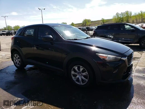 2016 Mazda CX-3 Sport z VIN JM1DKBB72G0106476, wystawiony jako Copart lot #56236245 z przebiegiem 161 207 mil mil oraz Szkody całkowita. Historia ofert i sprzedaży dostępna na DreamBid. Obrazek 13.