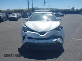 2019 Toyota C-HR XLE with VIN JTNKHMBX4K1040772, listed as a IAAI auction lot 41812031 with 79,729 mi miles. Bid and sale history available at carsss.com. Image 13.