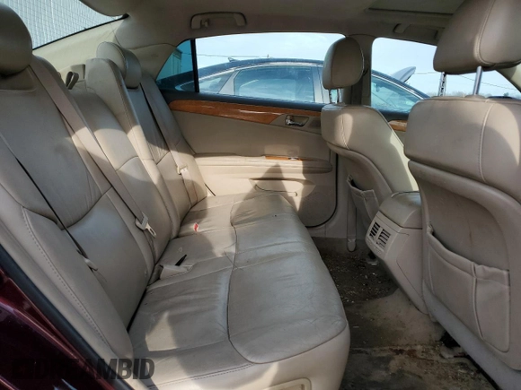 2006 Toyota Avalon XL z VIN 4T1BK36B16U137216, wystawiony jako Copart lot #88009545 z przebiegiem 204 876 mil mil oraz Szkoda całkowita • Salvage title. Historia ofert i sprzedaży dostępna na DreamBid. Obrazek 10.