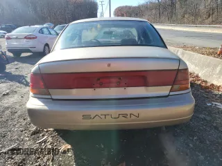 1998 Saturn SL z VIN 1G8ZK5275WZ210570, wystawiony jako Copart lot #82993114 z przebiegiem 144 690 mil mil oraz Szkody całkowita. Historia ofert i sprzedaży dostępna na DreamBid. Obrazek 6.