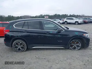 2017 BMW X1 sDrive28i with VIN WBXHU7C36HP924874, listed as a IAAI auction lot 41368396 with 113,443 mi miles. Bid and sale history available at carsss.com. Image 12.