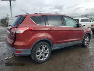 2016 Ford Escape Titanium with VIN 1FMCU9J91GUA99767, listed as a Copart auction lot 51172655 with 132,911 mi miles and Salvage title. Bid and sale history available at DreamBid. Image 3.