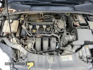 2013 Ford Focus SE z VIN 1FADP3F24DL216824, wystawiony jako Copart lot #52142715 z przebiegiem 149 611 mil mil oraz Szkoda całkowita • Salvage title. Historia ofert i sprzedaży dostępna na DreamBid. Obrazek 11.