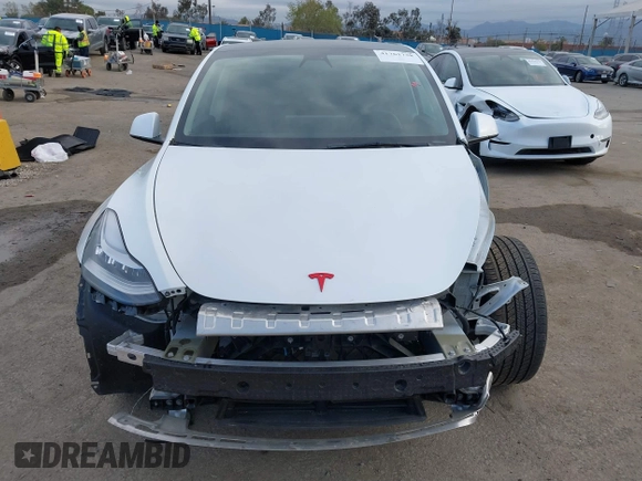 2021 Tesla Model Y Long Range with VIN 5YJYGDEE0MF209045, listed as a IAAI auction lot 41762738 with 24,721 mi miles. Bid and sale history available at carsss.com. Image 13.
