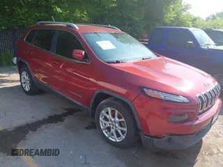 2014 Jeep Cherokee Latitude z VIN 1C4PJLCS0EW106284, wystawiony jako IAAI lot #42463467 z przebiegiem 148 500 mil mil oraz . Historia ofert i sprzedaży dostępna na DreamBid. Obrazek 1.