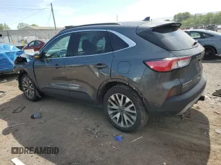 2020 Ford Escape Titanium с VIN 1FMCU9J99LUC63261, выставлен на аукционе Copart как лот 56312955 с пробегом Не указан миль и Списание • Salvage title. История ставок и продаж доступна на DreamBid. Изображение 2.
