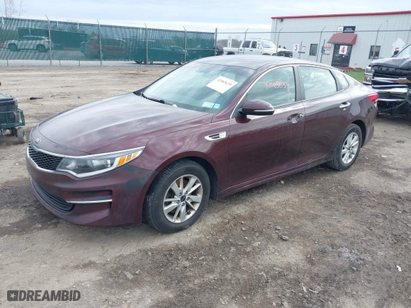 2016 Kia Optima LX with VIN 5XXGT4L36GG108599, listed as a IAAI auction lot 42065639 with 127,387 mi miles. Bid and sale history available at carsss.com. Image 17.