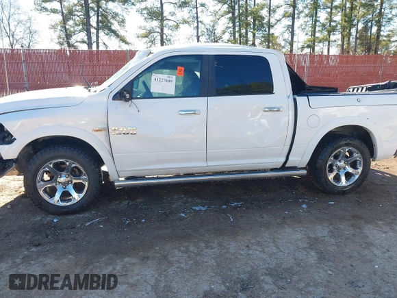 2017 Ram 1500 Laramie z VIN 1C6RR6NT4HS623048, wystawiony jako IAAI lot #41227009 z przebiegiem 124 457 mil mil oraz . Historia ofert i sprzedaży dostępna na DreamBid. Obrazek 14.
