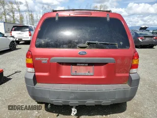2005 Ford Escape XLT with VIN 1FMYU93195KA54937, listed as a Copart auction lot 52060135 with 95,649 mi miles and Clean Title. Bid and sale history available at carsss.com. Image 6.