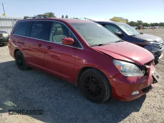 2005 Honda Odyssey Touring z VIN 5FNRL38865B002984, wystawiony jako Copart lot #55175255 z przebiegiem 99 393 mil mil oraz Szkoda całkowita • Salvage title. Historia ofert i sprzedaży dostępna na DreamBid. Obrazek 4.