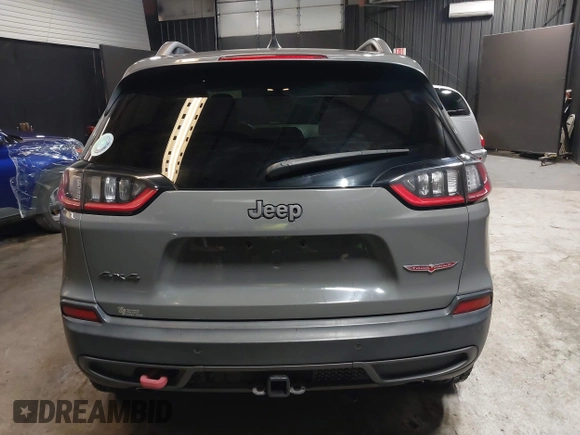 2019 Jeep Cherokee Trailhawk Elite with VIN 1C4PJMBX8KD458989, listed as a IAAI auction lot 41881517 with 89,045 mi miles. Bid and sale history available at carsss.com. Image 16.