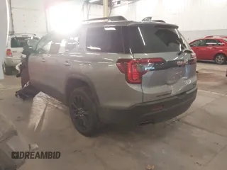 2023 GMC Acadia SLT with VIN 1GKKNULS7PZ133802, listed as a IAAI auction lot 41266532 with 22,214 mi miles and . Bid and sale history available at DreamBid. Image 3.
