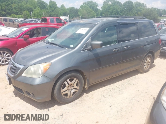 2008 Honda Odyssey EX-L with VIN 5FNRL38778B402015, listed as a IAAI auction lot 42252070 with 349,317 mi miles and . Bid and sale history available at DreamBid. Image 2.