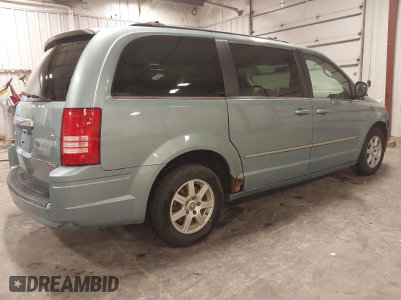 2010 Chrysler Town & Country Touring with VIN 2A4RR5D12AR344895, listed as a IAAI auction lot 41791990 with 259,541 mi miles. Bid and sale history available at carsss.com. Image 4.